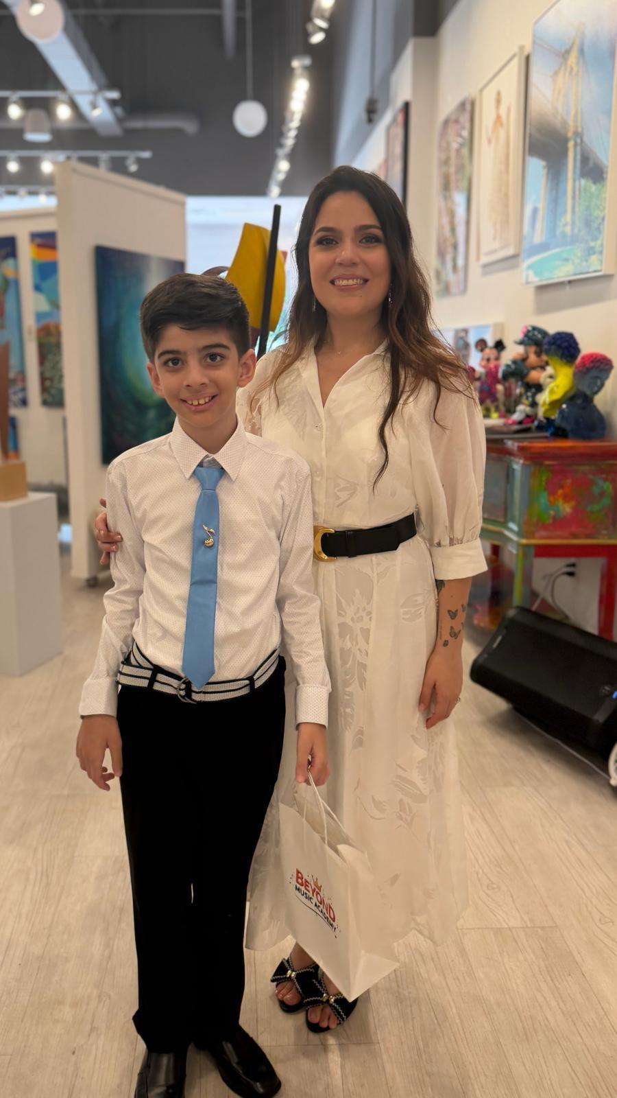 Student with teacher at recital